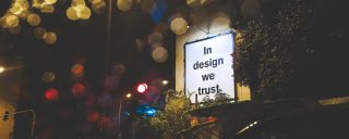 Panou outdoor "In Design We Trust"